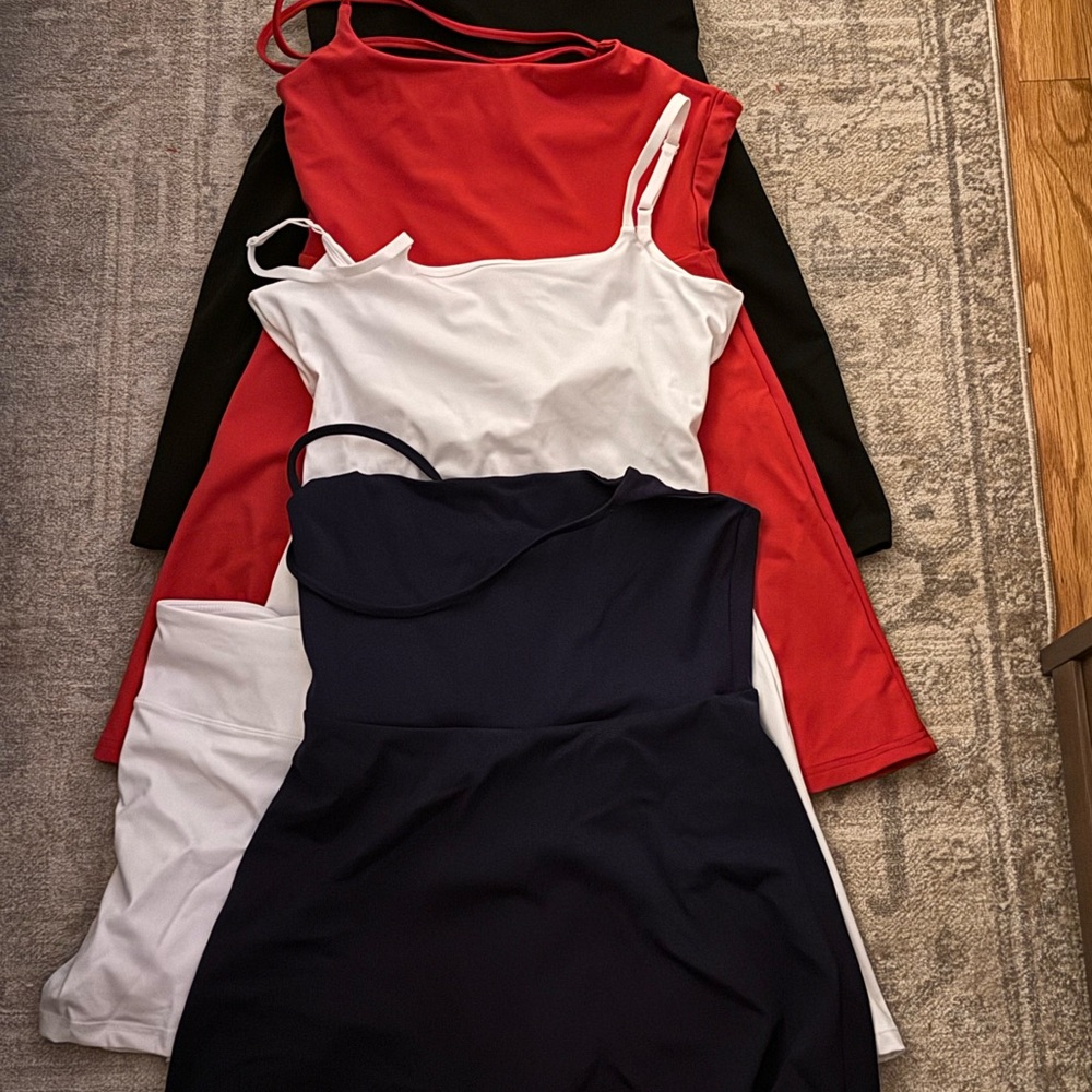 Selling as a set. Rompers. None have been worn. All size small.
